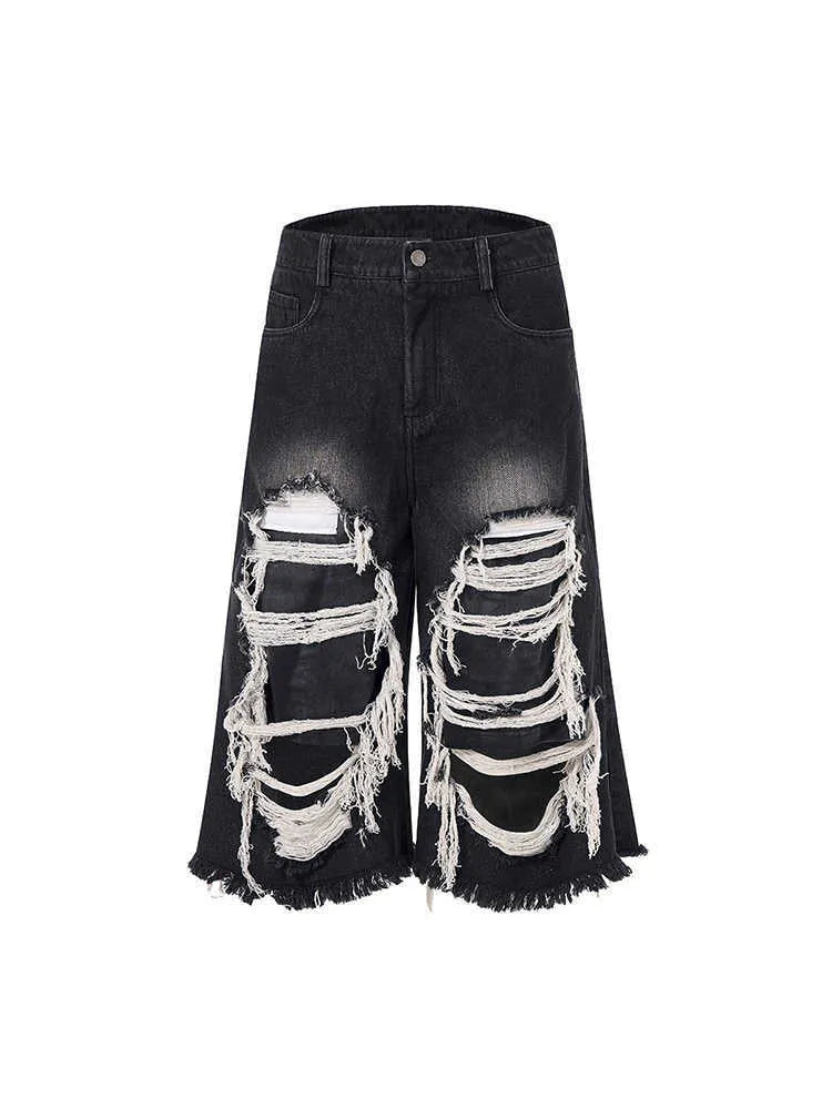 Black women's cropped wide-leg denim jeans with a mid-high waist on a hanger.