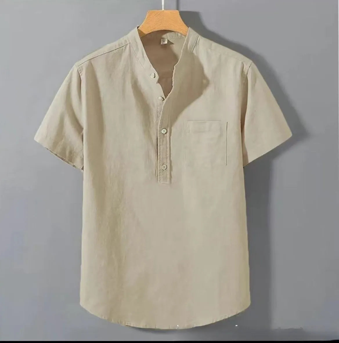 Men's beige casual short sleeve linen shirt with a stand collar and loose fit on a hanger.