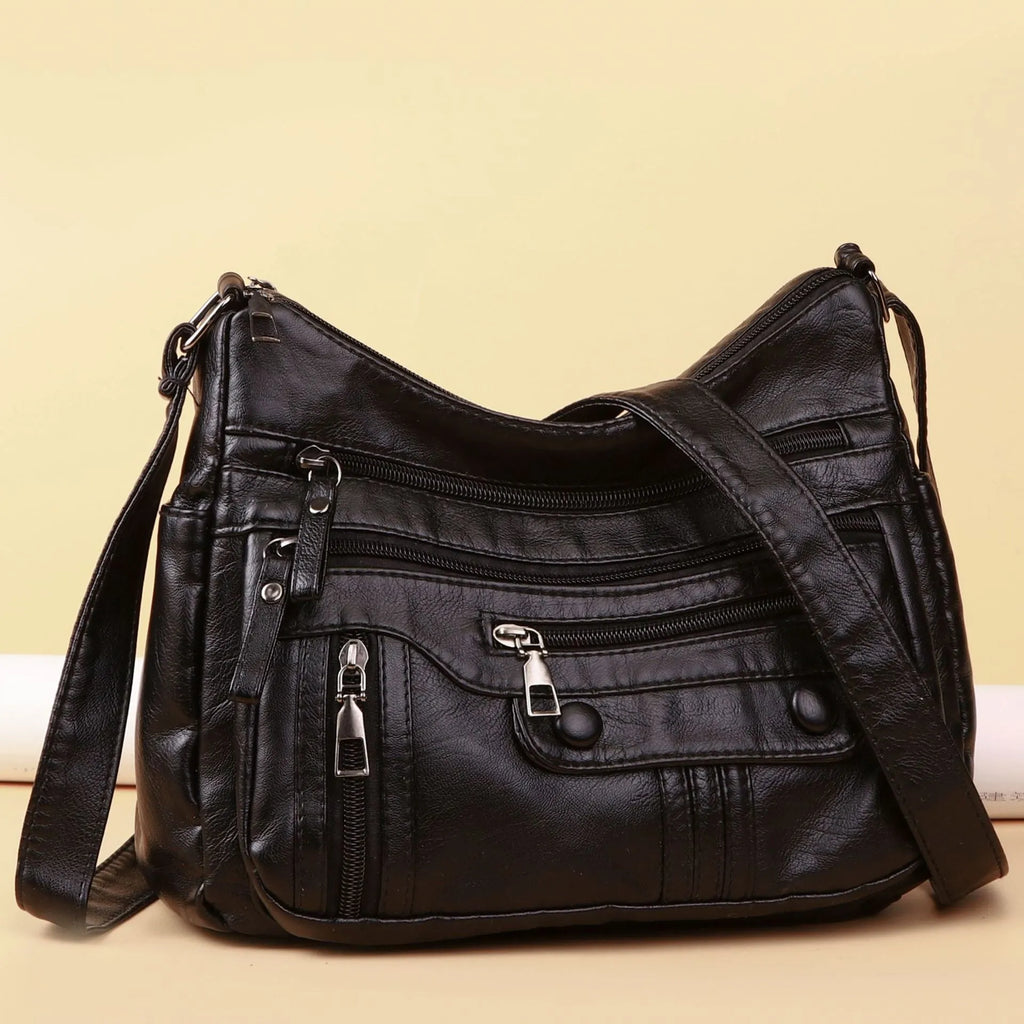 Soft PU leather shoulder bag for women in 8022 Black, with zippered compartments and cross-body strap