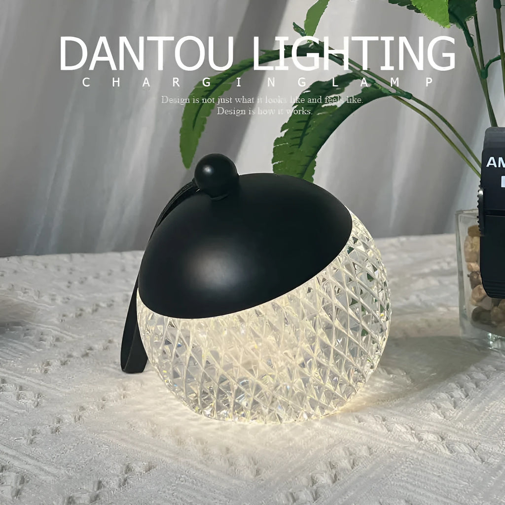 Portable dimmable LED night lamp with touch control in minimalist design, 12cm diameter and height