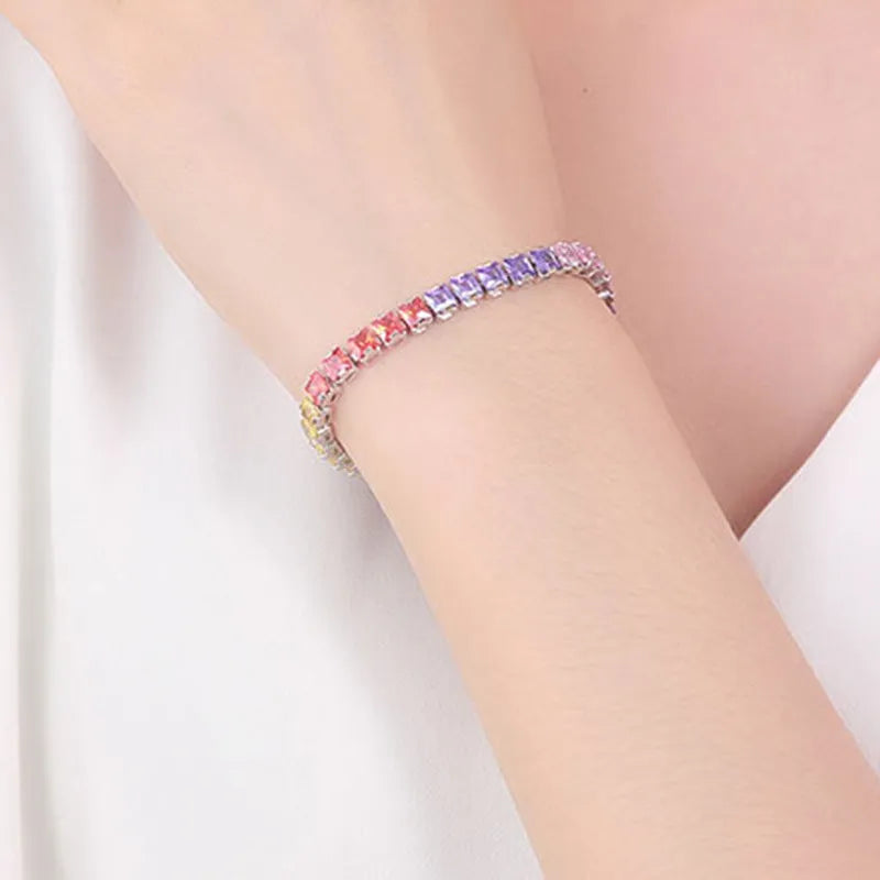 Electroplated real platinum women's square zircon bracelet with gang drill details in assorted colours.