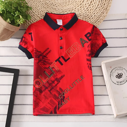 Boys short sleeve cotton T-shirt in navy blue with a lapel collar, laid flat.