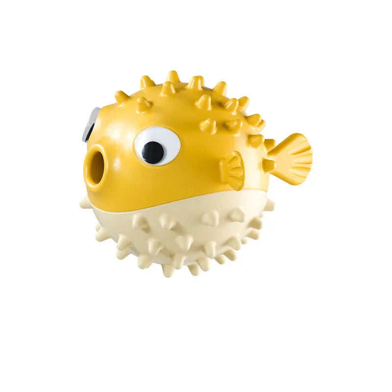 Fish-shaped interactive dog toy with treat dispensing opening and textured surface for medium and large dogs