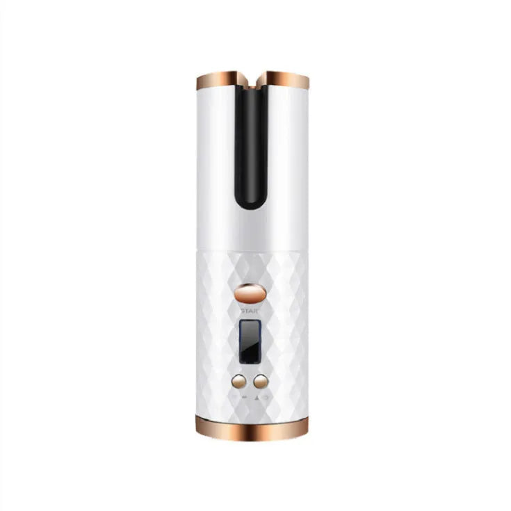 White portable automatic curling iron with a gold ceramic barrel and USB charging cable on a pink background.