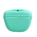 Coloured silicone dog treat bag with clip and magnetic opening, shown with dog training treats.