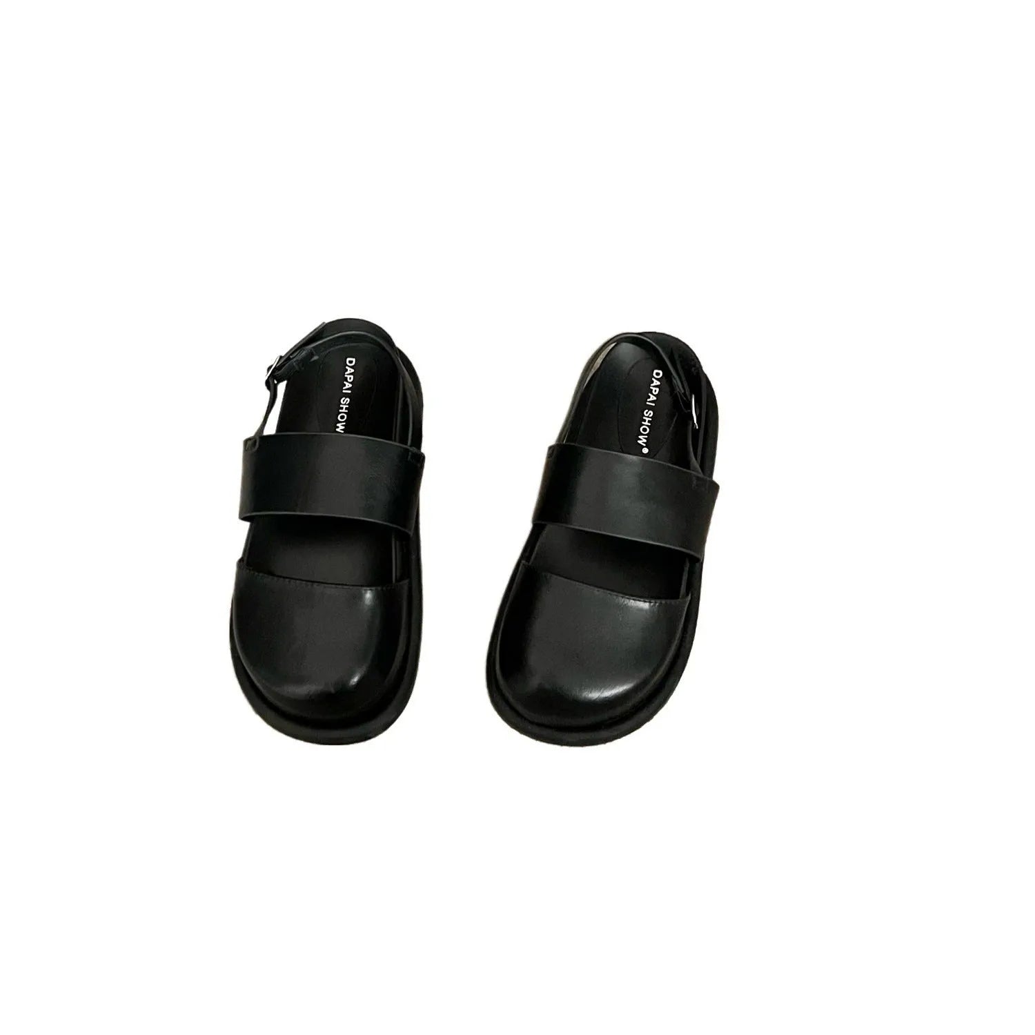 Retro closed toe sandals with raised bottom, ankle strap buckle, and round toe in apricot colour