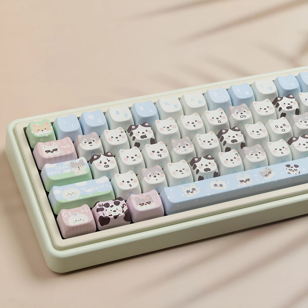 Full set of PBT plastic keycaps for mechanical keyboards with colourful sublimated cat and puppy animal designs.