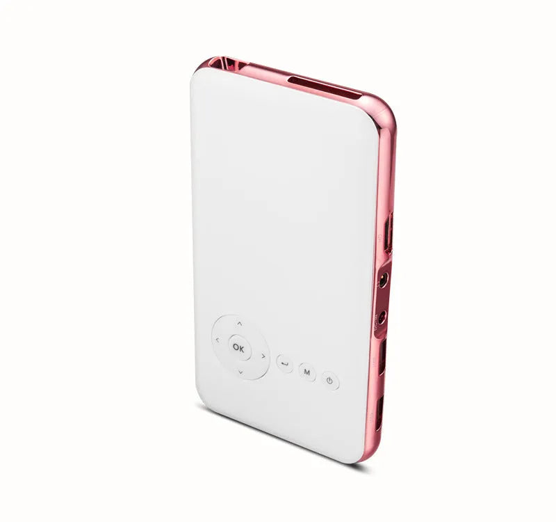 White and rose gold M6S miniature portable DLP Android projector with 32GB memory on a table.