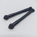 Double-headed black makeup brush with wooden handle for foundation and concealer application