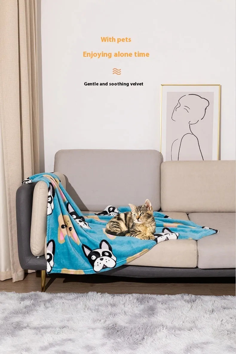 Blue cartoon dog pattern double-sided flannel pet blanket shown in a dog crate.