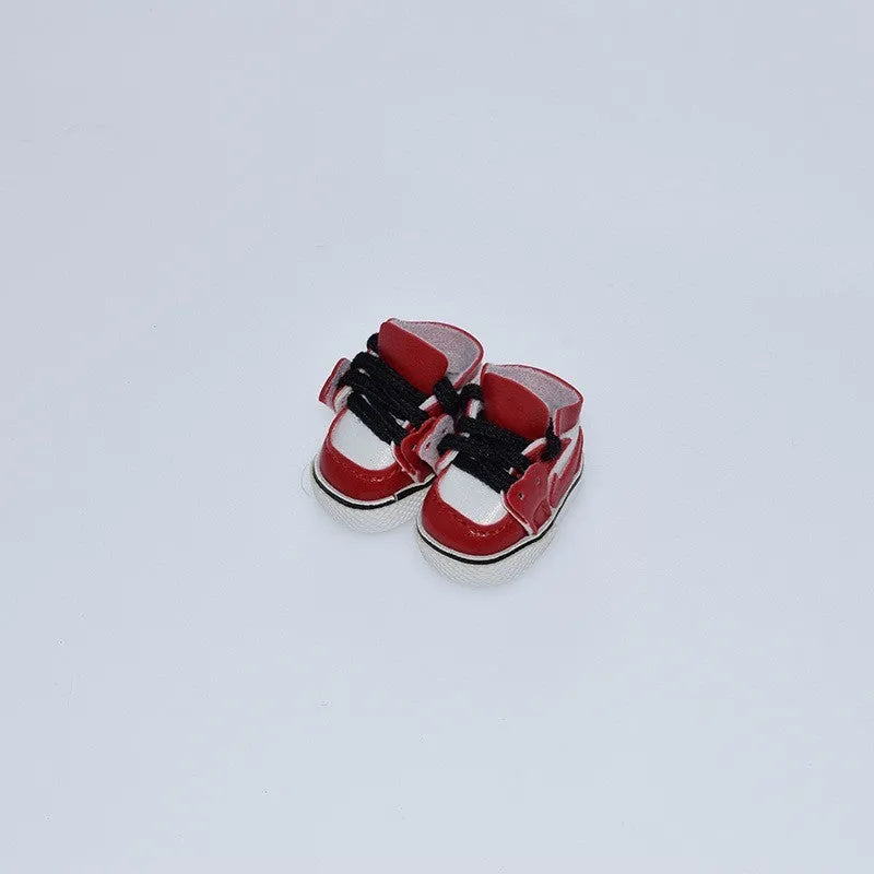 Set of miniature doll replacement shoes in various styles and colours for 17cm scale figures.