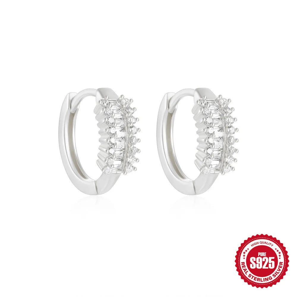 Sterling silver geometric stud earrings with diamond detailing in gold or silver finish