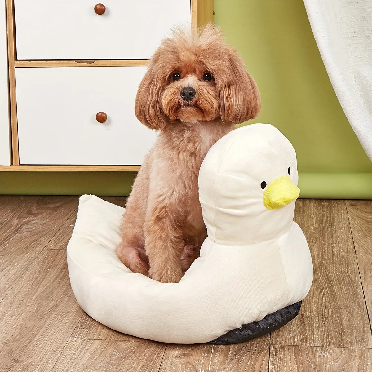 Blue duck-shaped fluffy pet sofa bed for small dogs and cats on a white background.