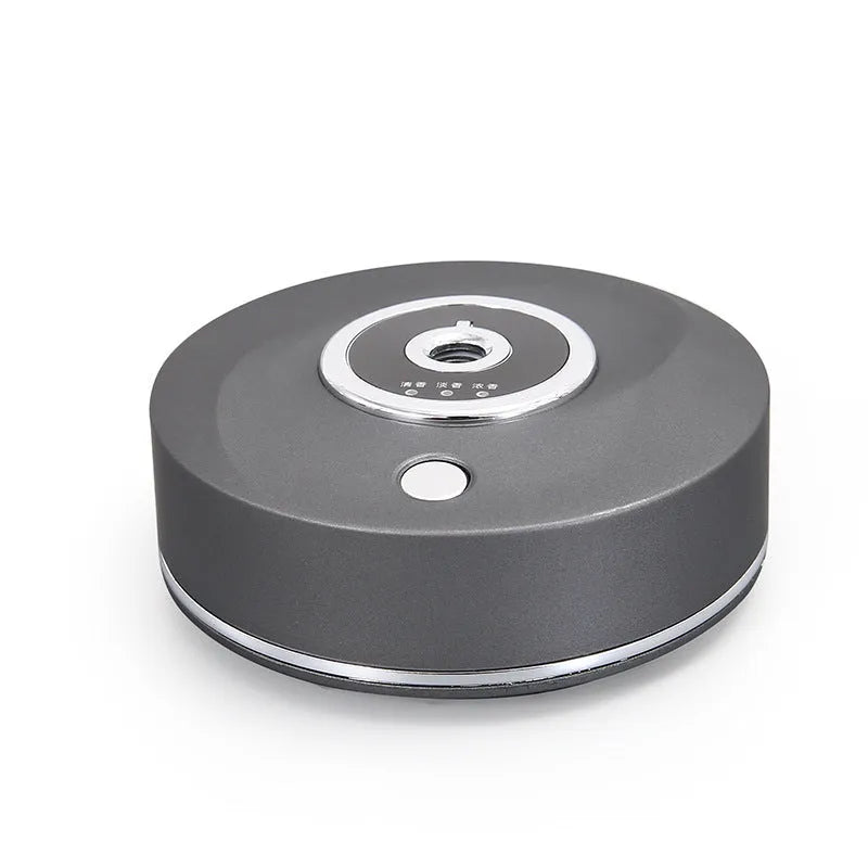 USB-powered car air freshener diffuser in black plastic with anti-slip pad for dashboard mounting