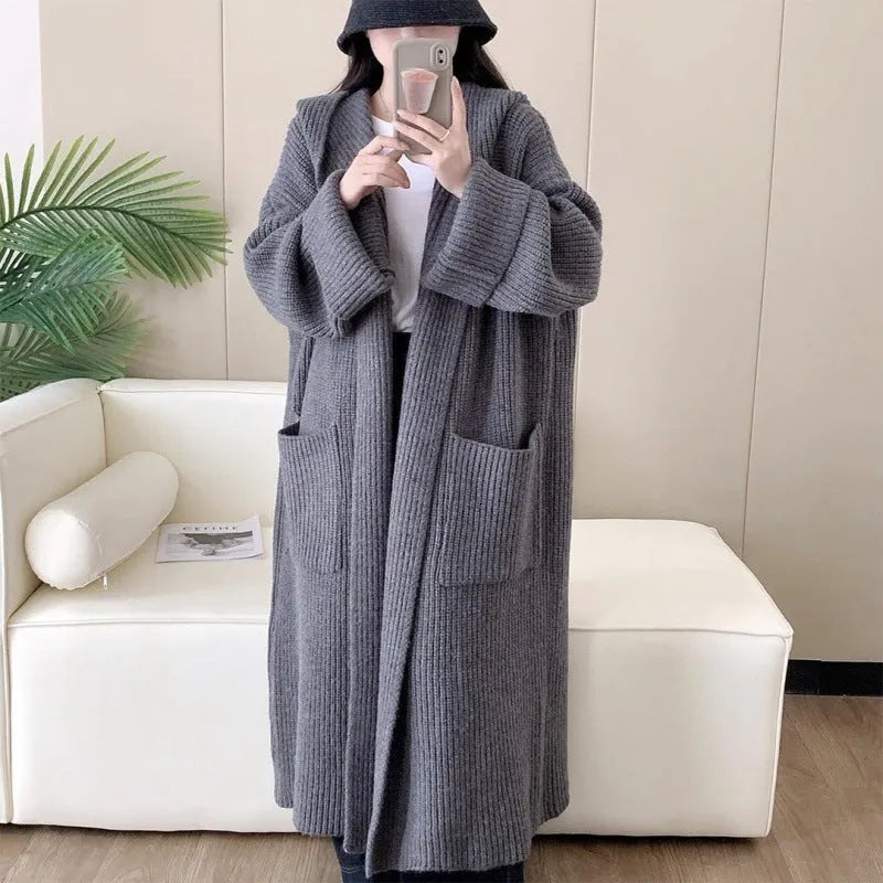 Loose fit women's hooded cardigan coat in soft acrylic fabric, shown in milky white.