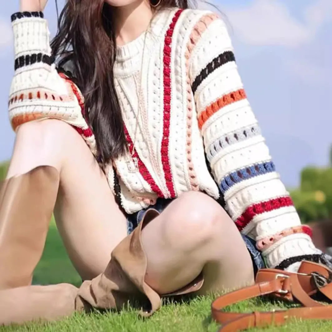 Rainbow striped hollow pattern sweater with batwing sleeves in loose fitting casual style