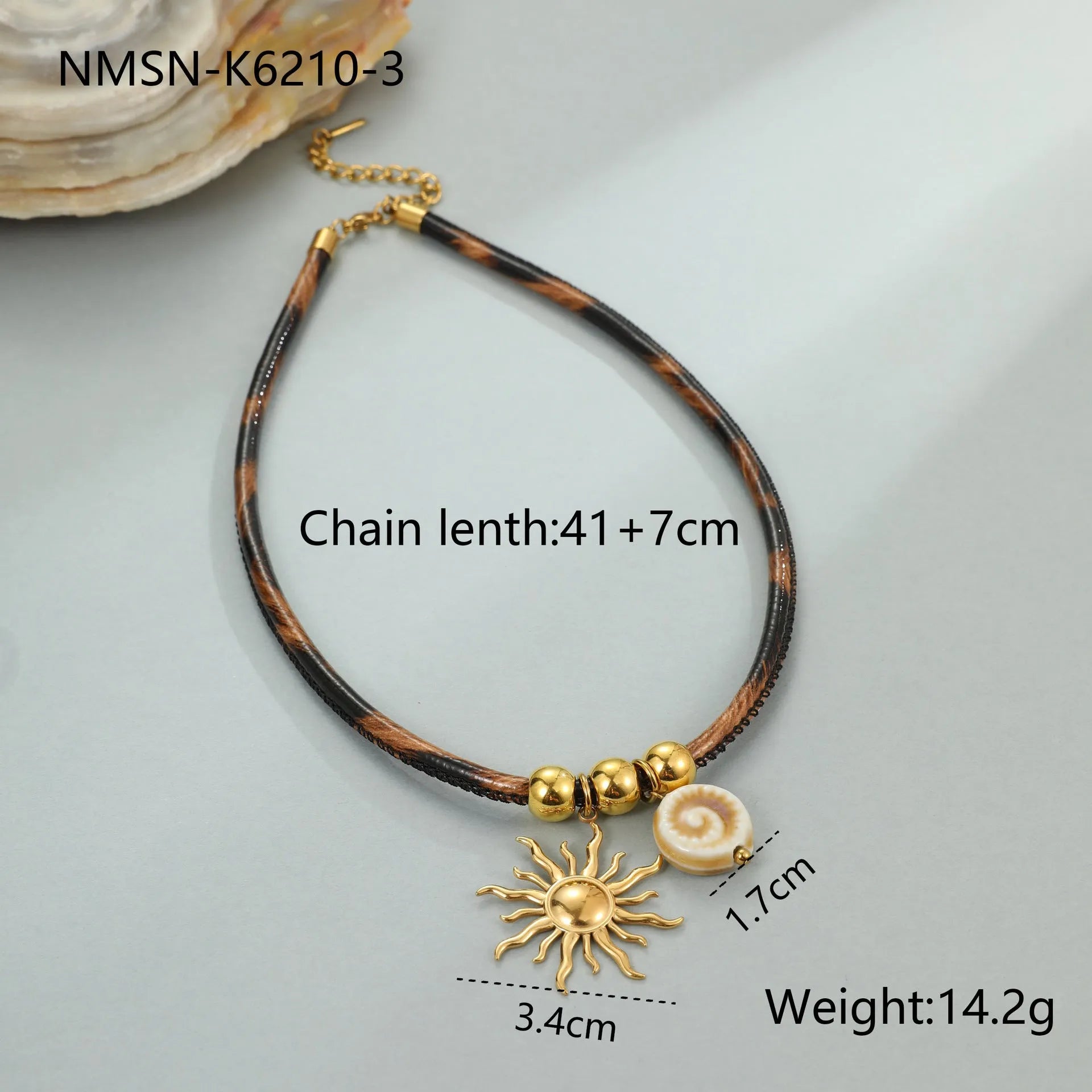 Geometric leopard print pendant on a gold-toned stainless steel necklace for women.