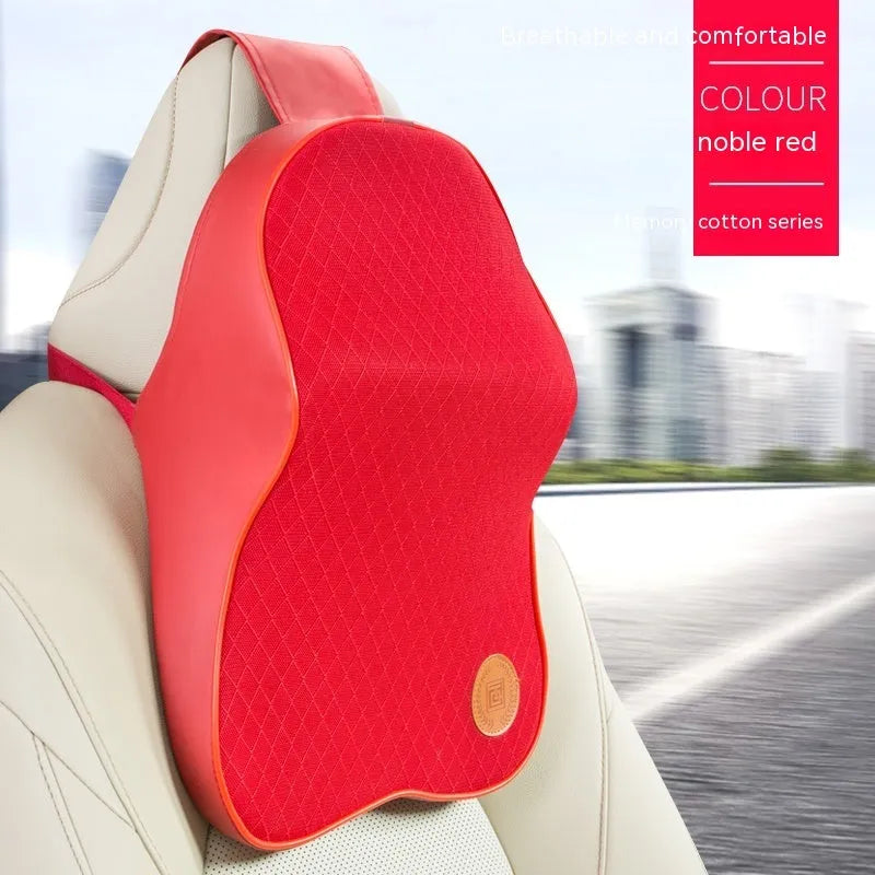 Black and brown memory foam car headrest pillow and lumbar support cushion set on a car seat.