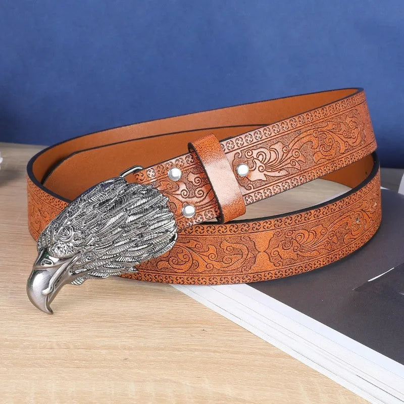 Men's black imitation leather belt with a detailed silver alloy cow head buckle and pin buckle fastening.