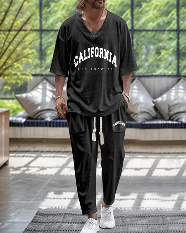 Women's grey polyester trousers suit with a V-neck cropped sleeve jacket