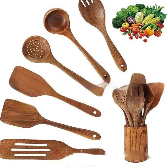 Boxed set of seven wooden kitchen utensils including cooking spoons, a spatula, and soup spoons.