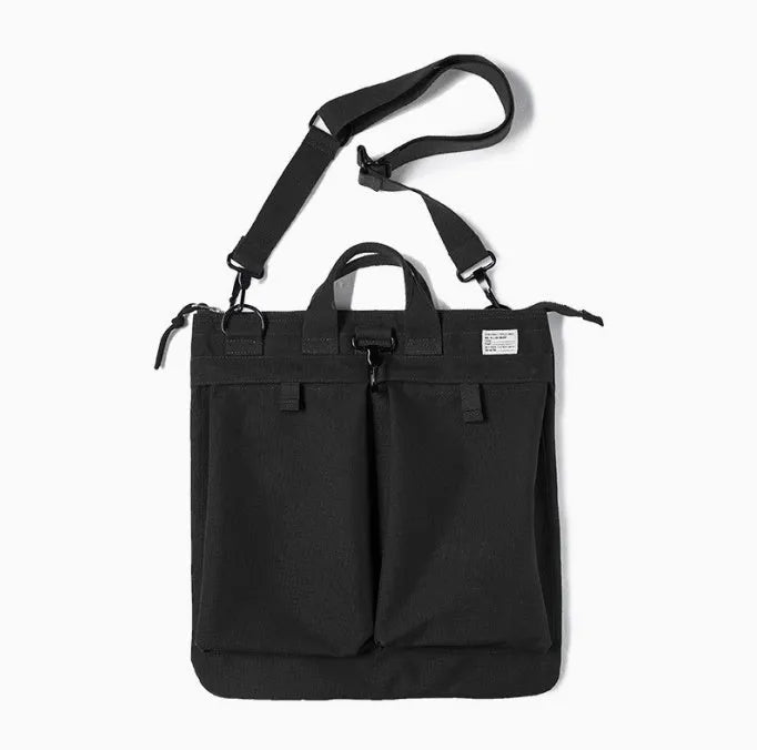 Medium vertical square canvas crossbody messenger bag in military green with shoulder strap