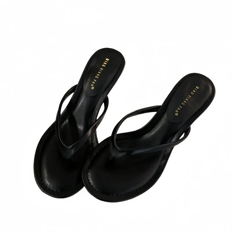 Women's flip-flop sandals with stiletto heel and round toe in open design