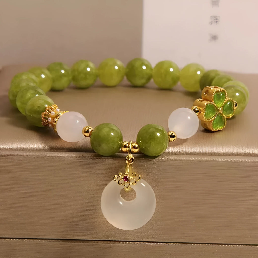 Natural stone green tourmaline women's bracelet with four-leaf clover charm and safety buckle closure