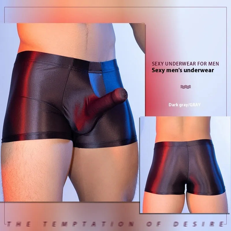 Red men's nylon boxers with an elephant nose design on a mid waist.