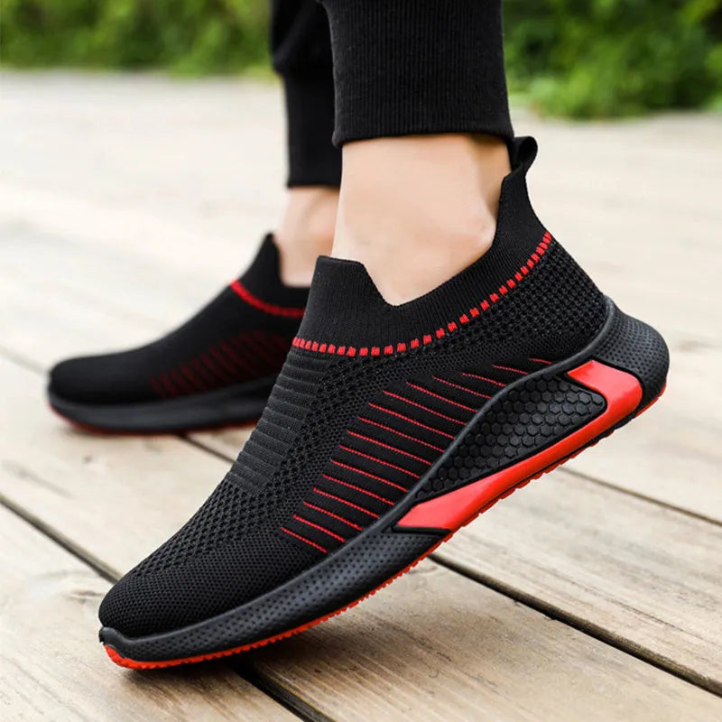 Men's black and white mesh sock sneakers with a striped design and lace-up front.