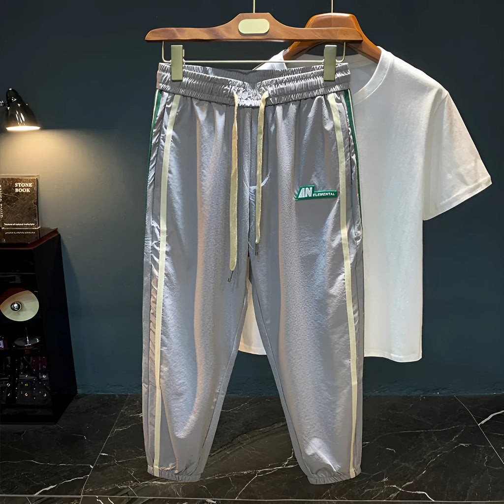 Men's black ice silk cotton harem pants with a relaxed fit and mid-waist.