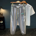 Men's black ice silk cotton harem pants with a relaxed fit and mid-waist.