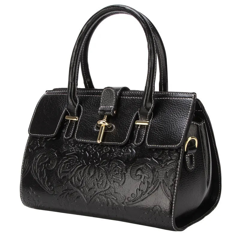 Genuine leather women's vintage crossbody bag in oval shape with embossed detailing