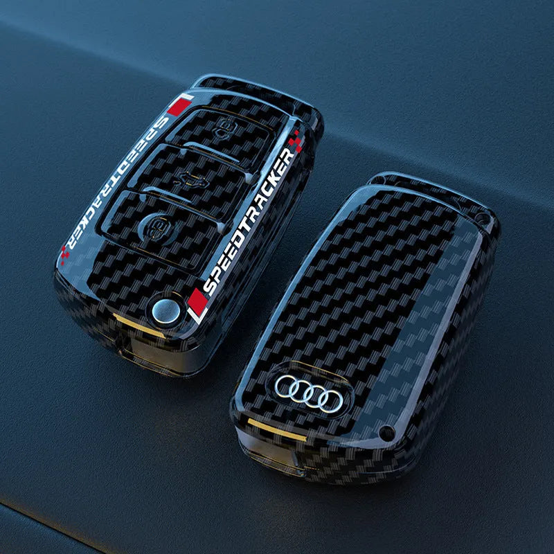 Carbon fibre style car key cover with mirror element in carbon black colour