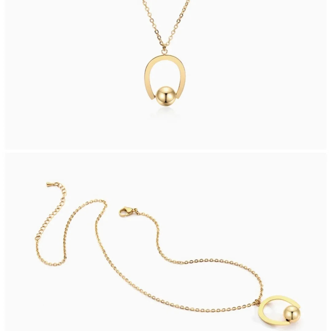 Stainless steel geometric pendant necklace on cross chain in gold or silver finish