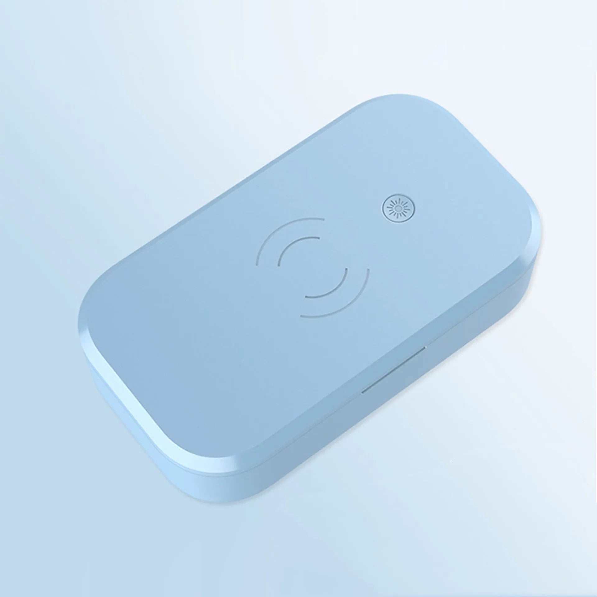White ultraviolet disinfection box with wireless phone charging top and USB cable.