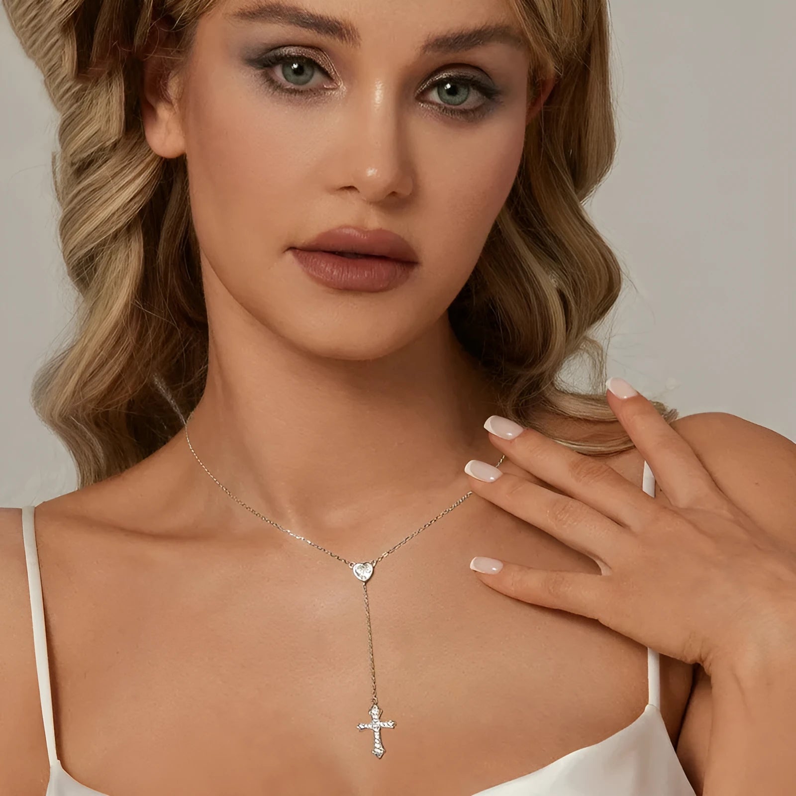 Sterling silver V-neck love cross pendant necklace on an O-ring chain in colour BSN384.