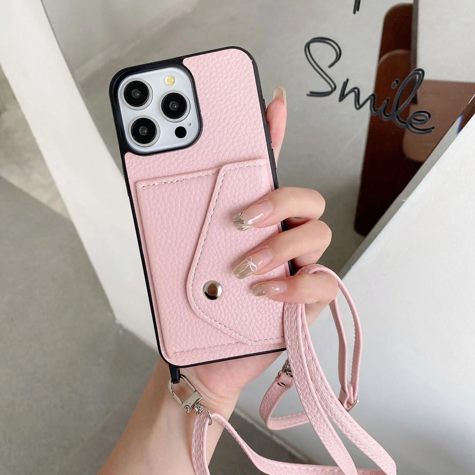 Lychee pattern imitation leather phone case with crossbody strap and triangle card holder for iPhone 14