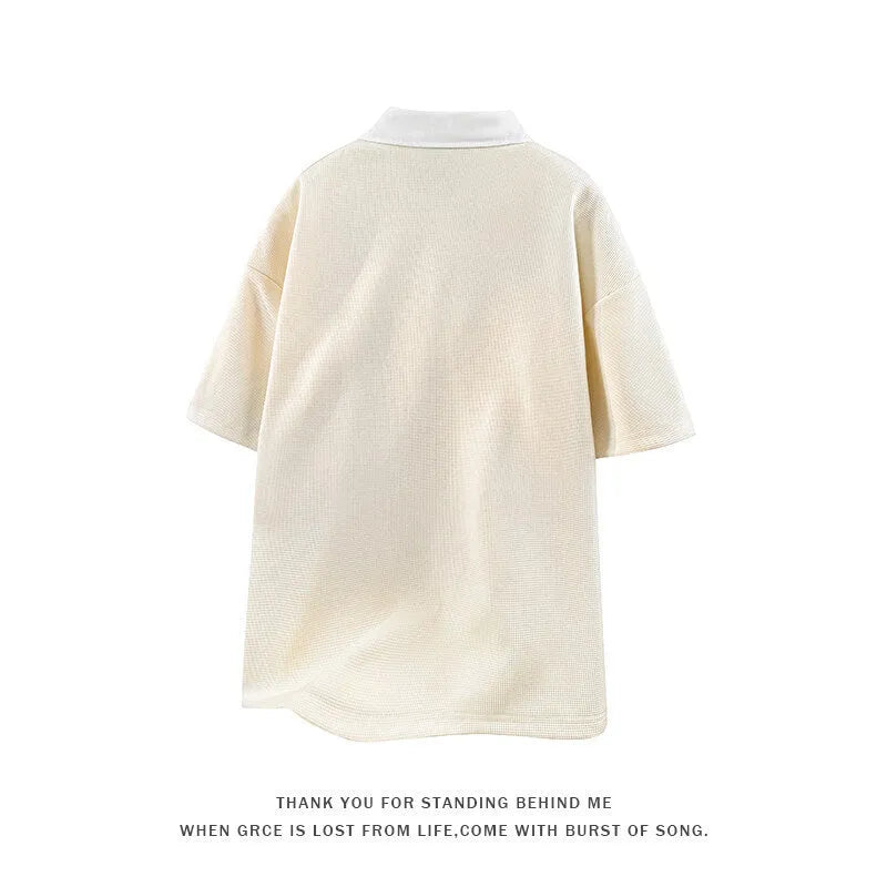 Men's apricot coloured polo shirt sweater with a structured heavy Henry collar and short sleeves