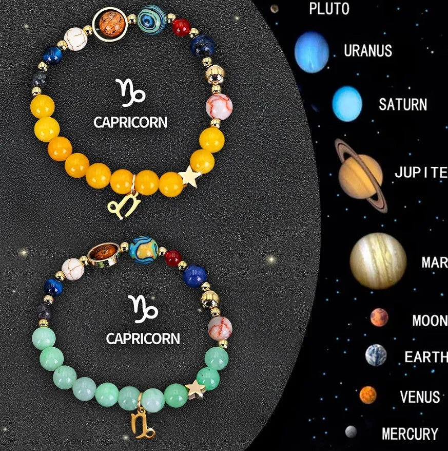Two natural stone beaded bracelets for zodiac signs on a neutral background.