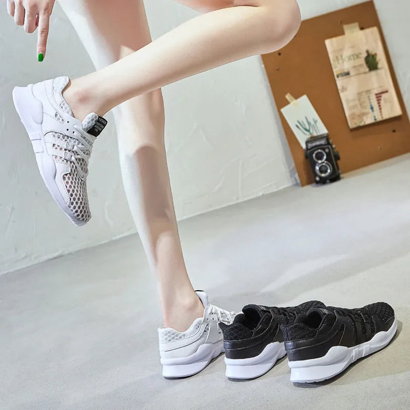 Breathable hollow-out mesh casual sneakers in black and white colour options with EVA sole