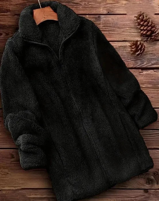 Double-sided velvet fleece jacket in black, shown on a hanger.