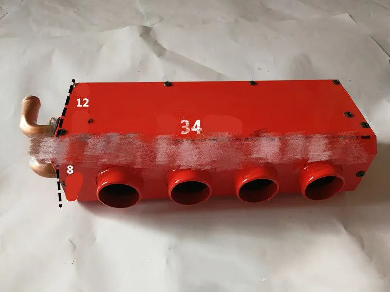 Metal car heater unit with four small copper pipe connectors for 12V/24V vehicle installation.