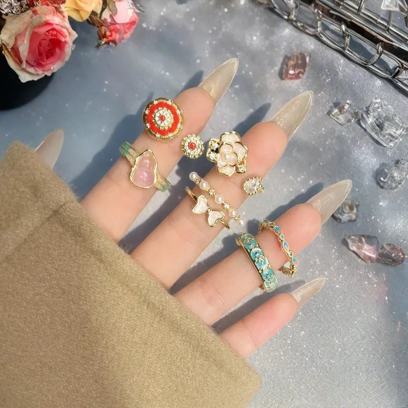 Adjustable vintage oil-dripping gourd copper ring with zircon inlay, showing flower shape in one of six colour options.