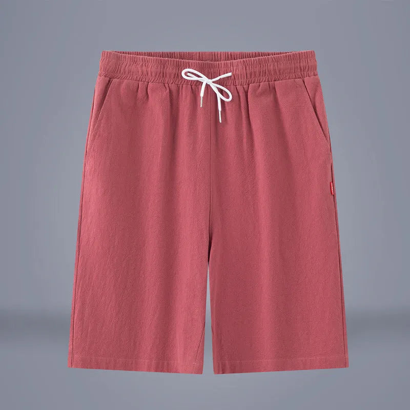 Solid colour cotton linen cropped summer pants with a drawstring waist on a hanger.