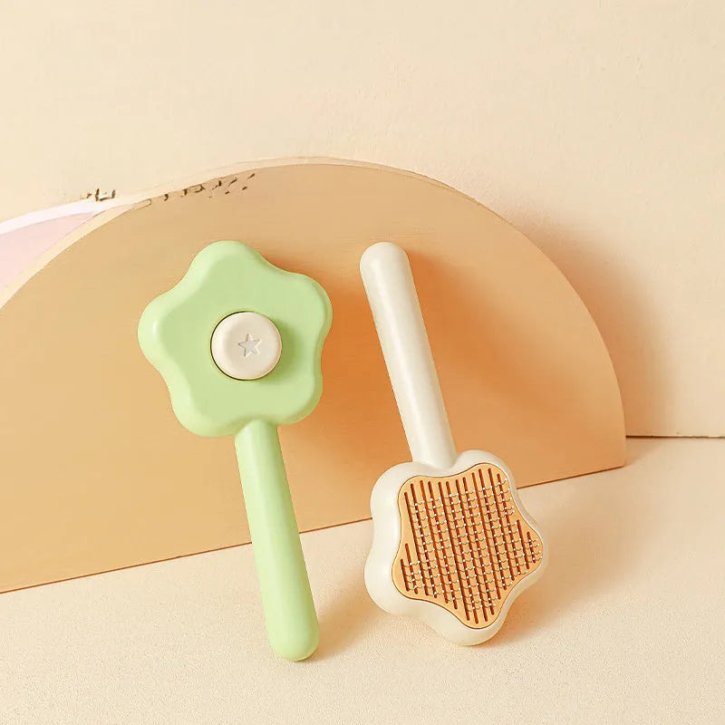 Self-cleaning cat comb magic wand with stainless steel needle teeth in green or yellow colour options