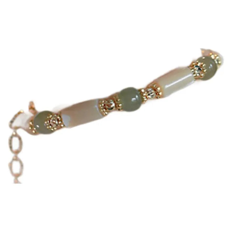 Natural Hetian Jade white lip shell bracelet for women with round beads and geometric design