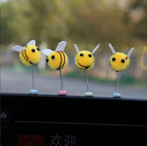 Swing spring bee car decoration with fur ball construction and cartoon design measuring 3x3cm