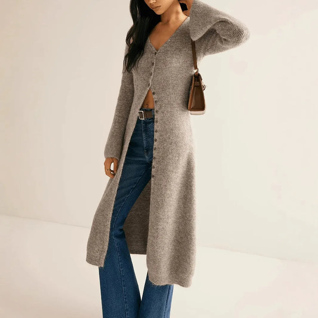 Khaki French retro long sleeve cardigan with button front on a model.