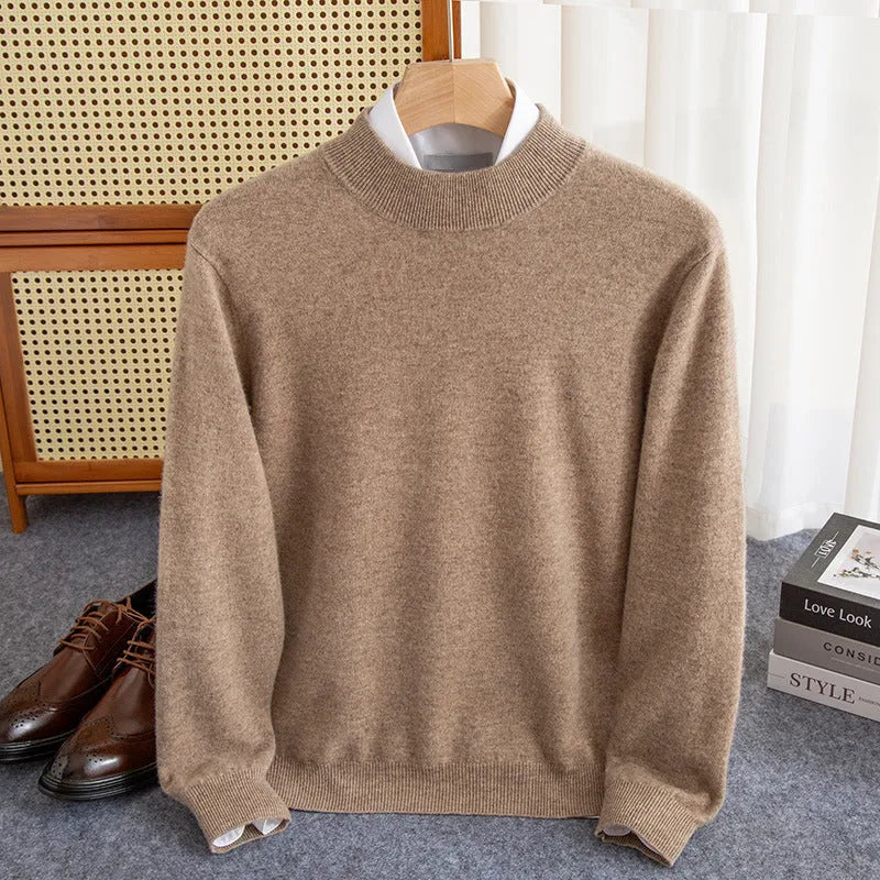 Man wearing a loose-fit half-collar wool sweater in a textured knit, shown in one of the available colours like camel or dark grey.